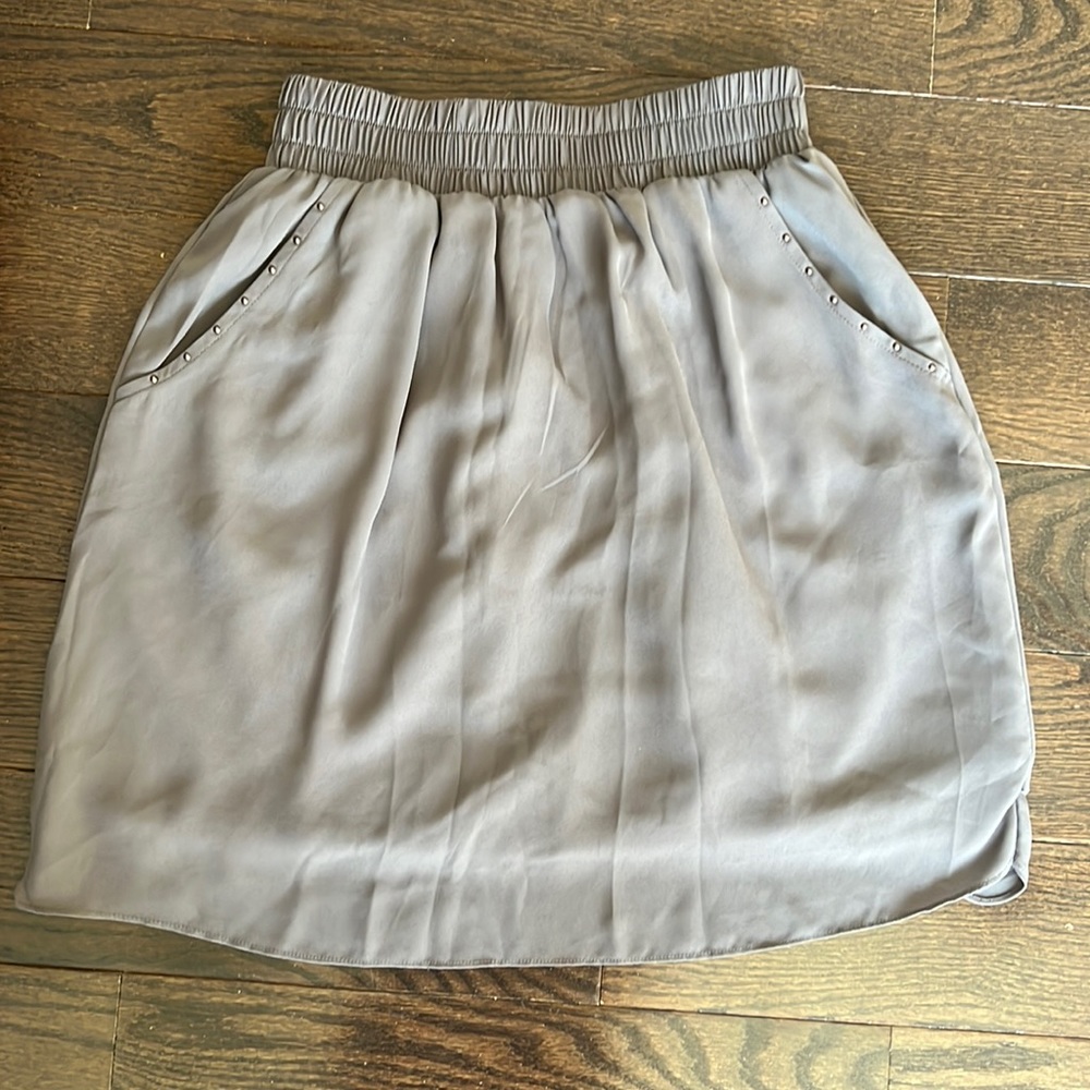 Gray shirt with gold studs on pockets. Size XS